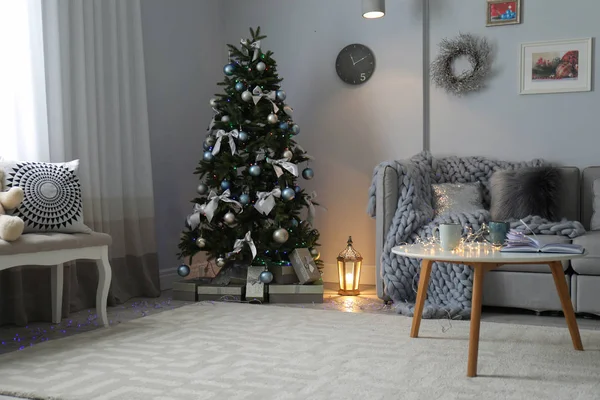 Living room interior with decorated Christmas tree