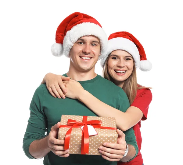 白色背景圣诞礼物的年轻夫妇 — 图库照片