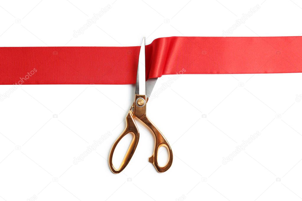 Ribbon and scissors on white background, top view. Ceremonial red tape cutting