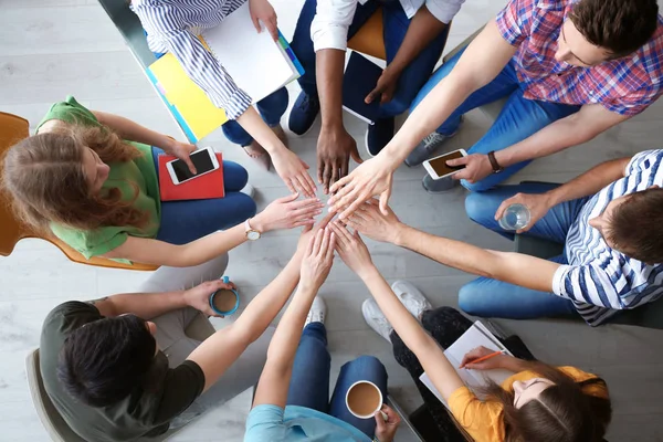 People Putting Hands Together Indoors Top View Unity Concept — Stock Photo, Image