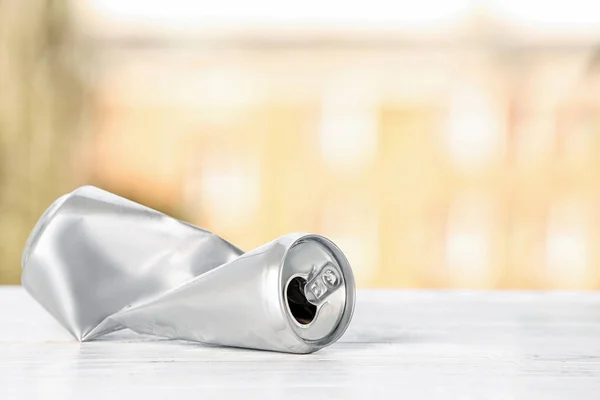 Crumpled Aluminum Can Table Blurred Background Metal Waste Recycling — Stock Photo, Image
