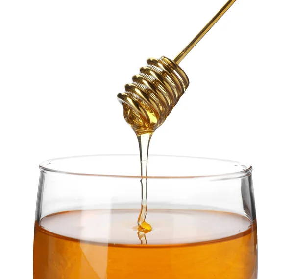 Μέλι Στάζει Από Κουτάλα Βάζο Λευκό Φόντο — Φωτογραφία Αρχείου