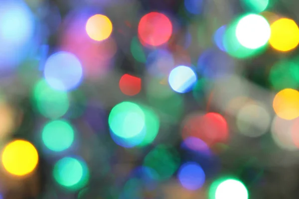 Rozmazaný Pohled Zářící Vánoční Světla Jako Pozadí — Stock fotografie