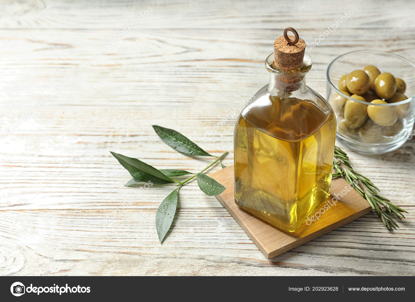 Bottle Fresh Olive Oil Table Stock Photo by ©NewAfrica 202923628
