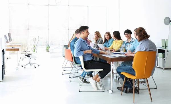 Young people having business training in office