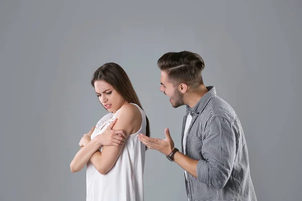 Young Couple Having Argument Grey Background Relationship Problems — Stock Photo, Image