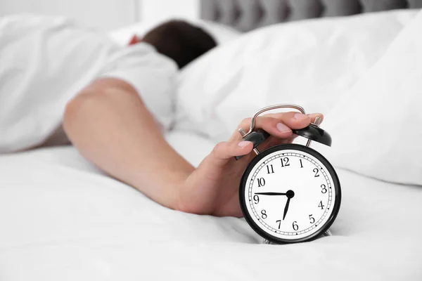 Man Turning Alarm Clock Bedroom Royalty Free Stock Photos