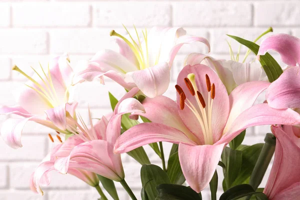 Beautiful Blooming Lily Flowers Brick Wall Background — Stock Photo, Image