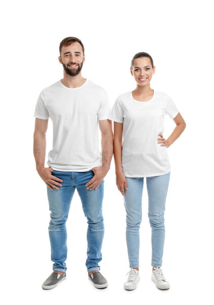 Young couple in t-shirts on white background. Mockup for design