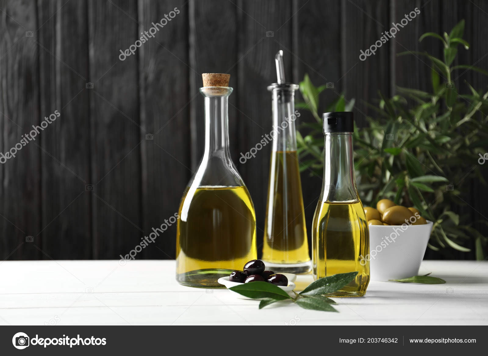 Composition Fresh Olive Oil Table Stock Photo by ©NewAfrica 203746342