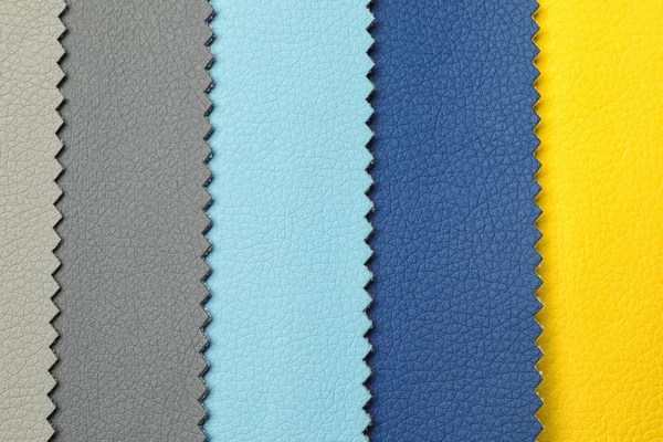 Leather samples of different colors for interior design as background