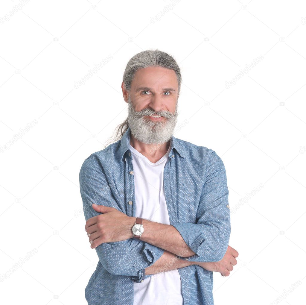 Handsome bearded mature man on white background