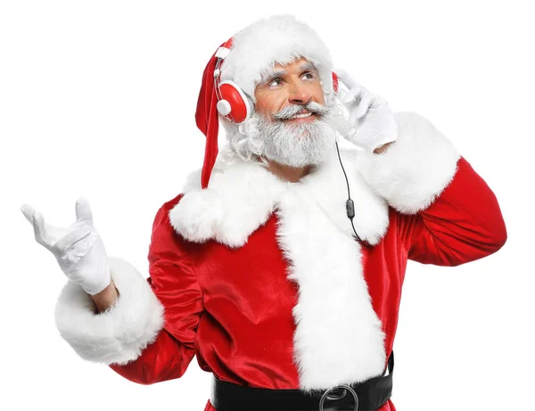 Santa Claus Escuchando Música Navideña Sobre Fondo Blanco —  Fotos de Stock