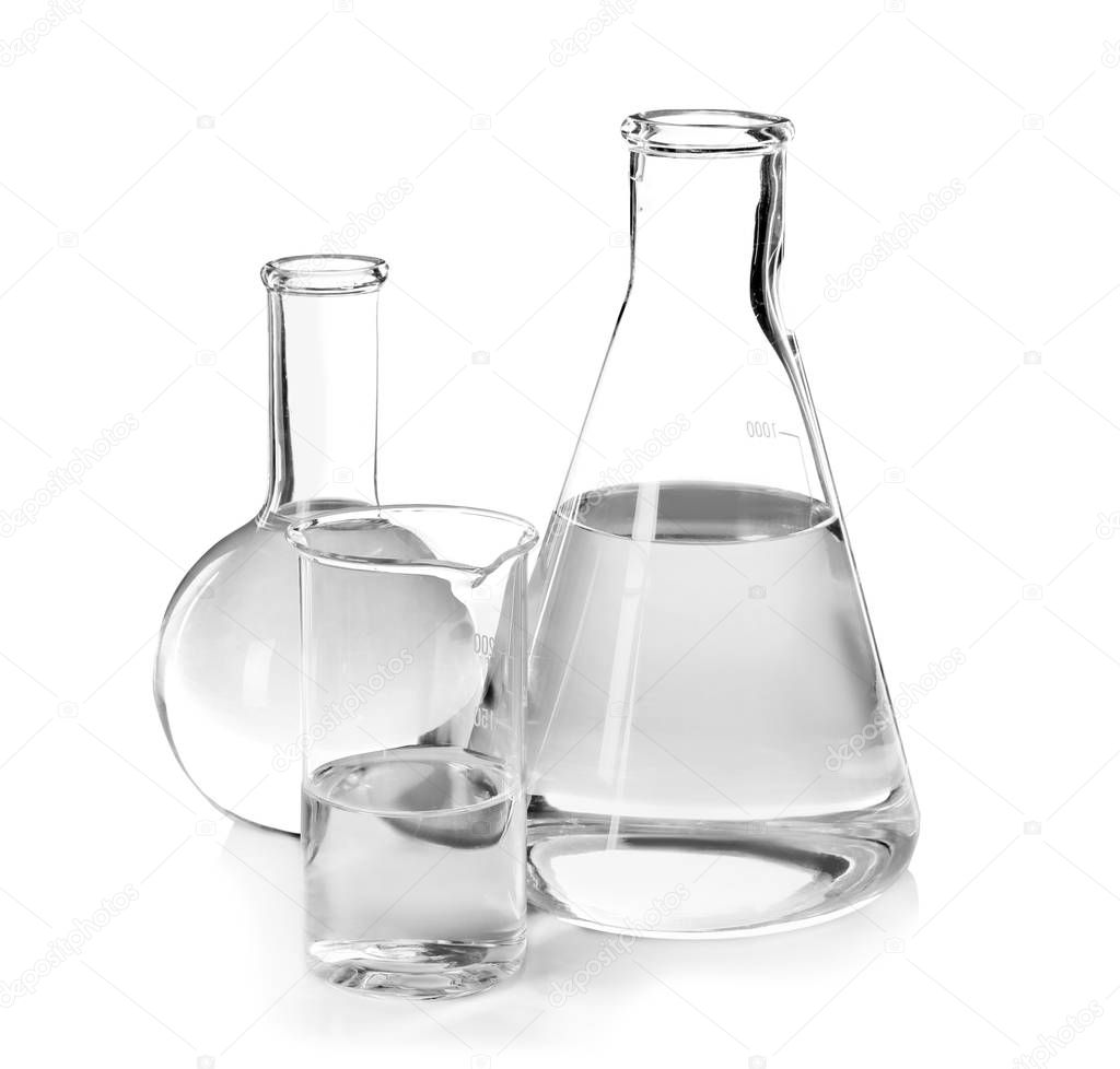 Flasks with liquid on white background. Laboratory analysis equipment