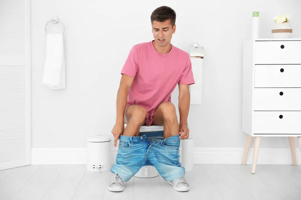 Young Man Suffering Diarrhea Toilet Bowl Home — Stock Photo, Image