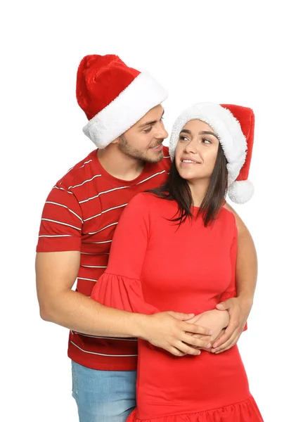 Joven Pareja Feliz Con Sombreros Santa Sobre Fondo Blanco Celebración —  Fotos de Stock