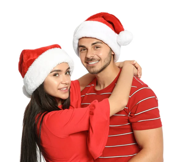 Jovem Casal Feliz Com Chapéus Papai Noel Fundo Branco Celebração — Fotografia de Stock