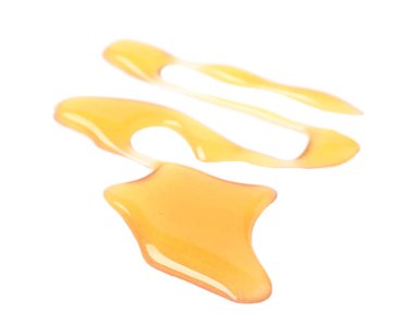 Beyaz arka plan üzerinde tatlı bal damla