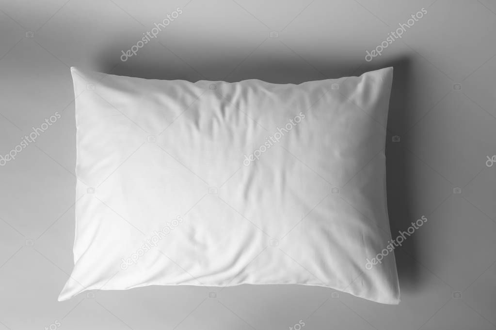 Blank soft pillow on light background