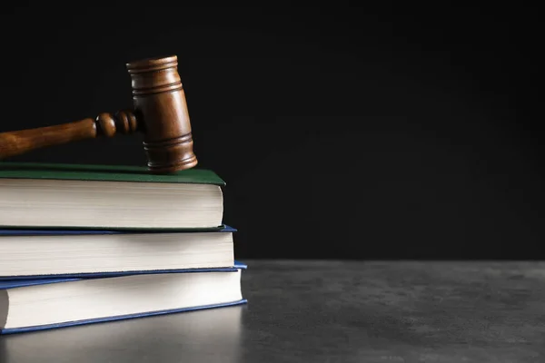 stock image Judge's gavel and stack of books on table. Law concept