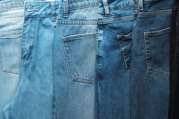 Jeans Cores Diferentes Como Fundo — Fotografia de Stock