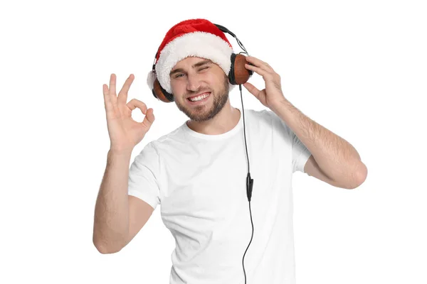 Jeune Homme Chapeau Père Noël Écoutant Musique Noël Sur Fond — Photo