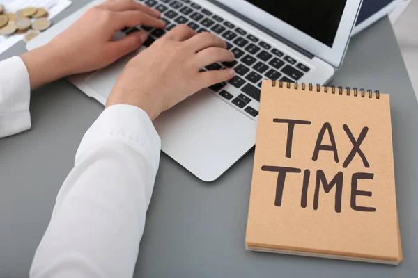 Young Female Calculating Taxes Table Closeup — Stock Photo, Image