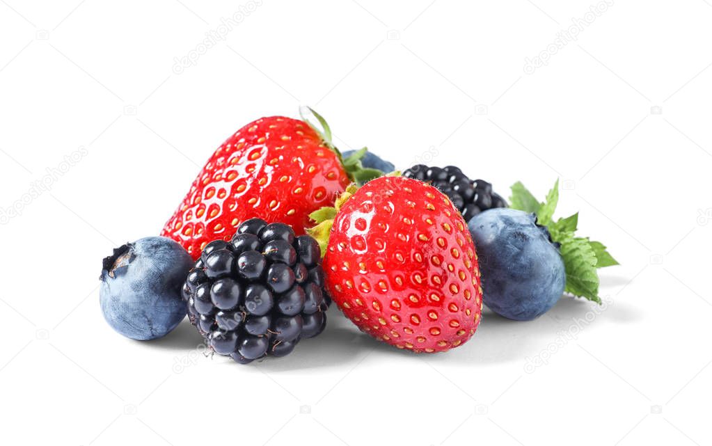 Strawberries, blackberries and blueberries on white background