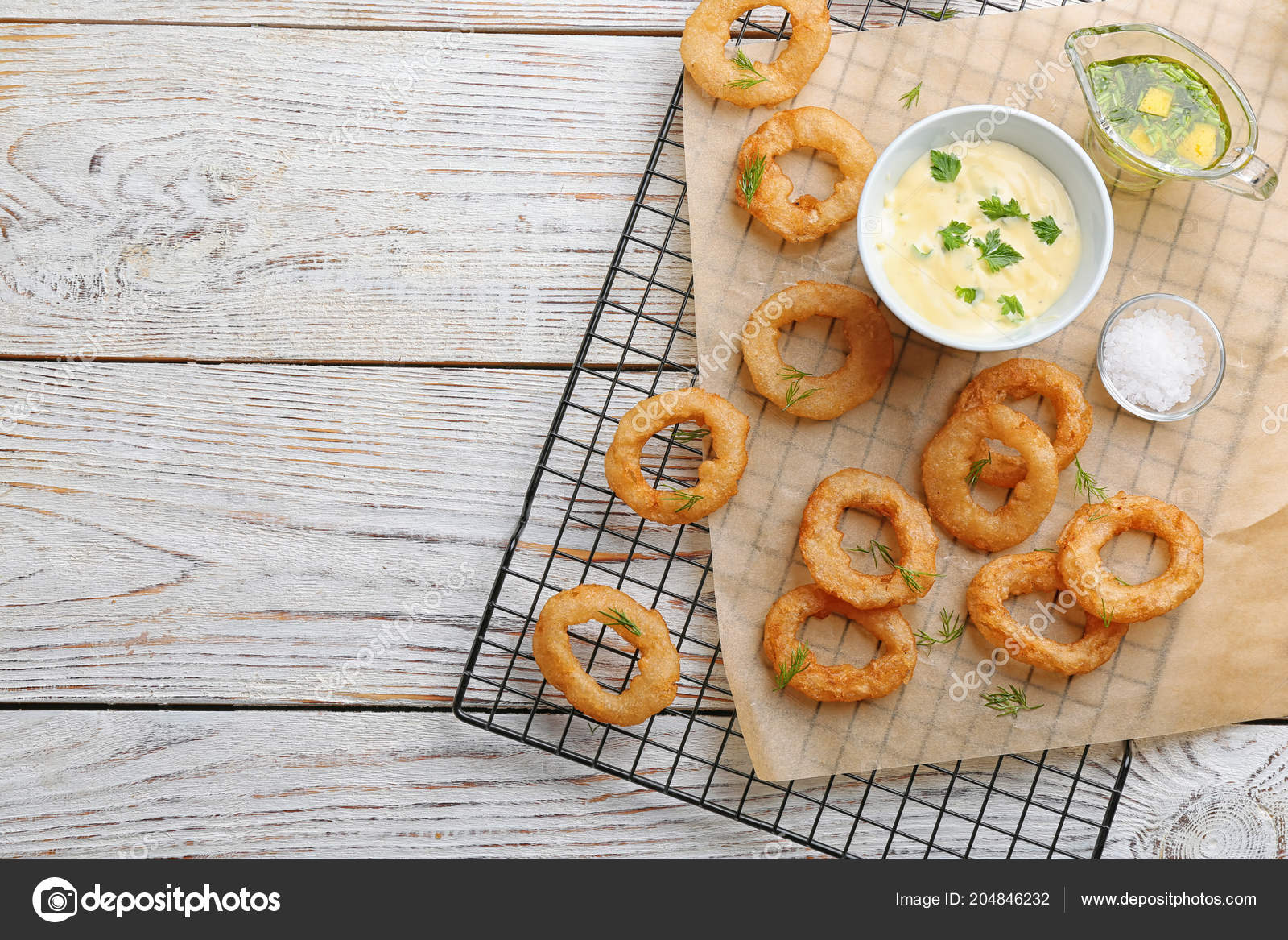 Cooling Rack Fried Onion Rings Sauces Wooden Background Top View Cooling Rack Fried Onion Rings Sauces Wooden Background Top View Stock Photo