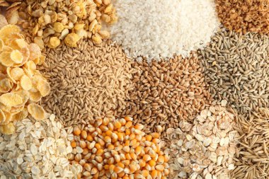 Different types of grains and cereals as background clipart