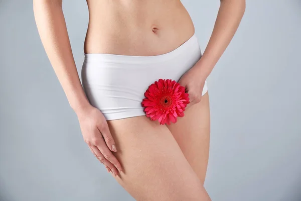 Young Woman Holding Flower Underwear Grey Background Gynecology — Stock Photo, Image
