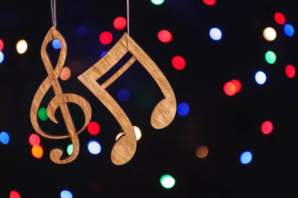 Holzschlüssel Und Note Gegen Defokussiertes Licht Weihnachtsmusik Konzept — Stockfoto