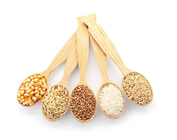 Cucharas Con Diferentes Tipos Granos Cereales Sobre Fondo Blanco — Foto de Stock