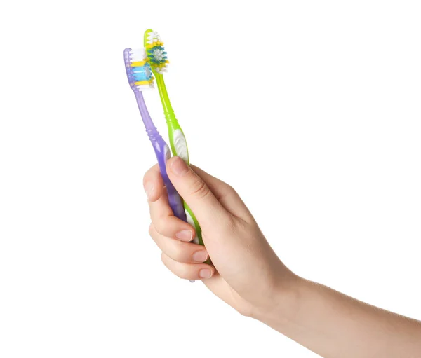Mulher Segurando Escovas Dentes Manuais Contra Fundo Branco — Fotografia de Stock