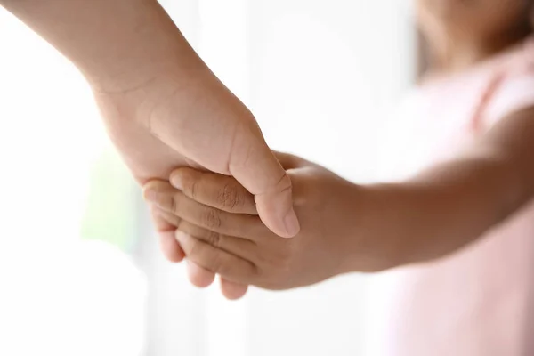 Children Holding Hands Light Background Closeup Unity Concept — Stock Photo, Image