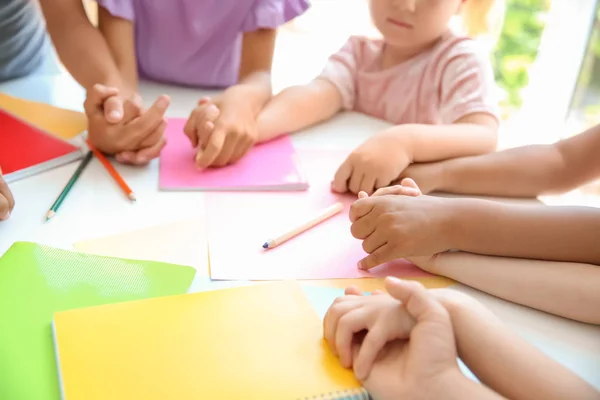 Little Children Holding Hands Table Closeup Unity Concept — Stock Photo, Image