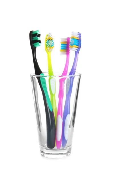Tasse Mit Verschiedenen Zahnbürsten Auf Weißem Hintergrund Zahnpflege — Stockfoto