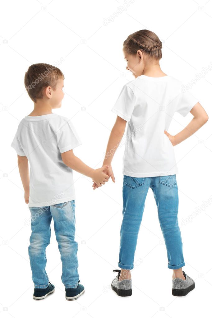 Little kids in t-shirts on white background. Mockup for design