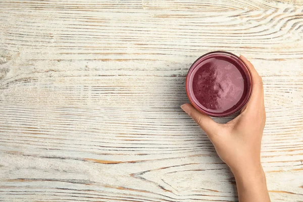 Woman Holding Glass Delicious Acai Juice Table Top View — Stock Photo, Image
