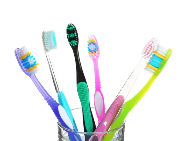Cup Different Toothbrushes White Background Dental Care — Stock Photo, Image