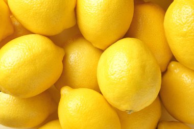 Arka plan olarak birçok taze olgun limon