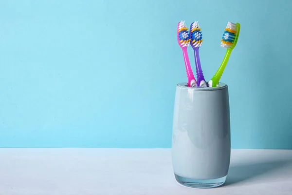 Cup Toothbrushes Table Color Background Dental Care — Stock Photo, Image