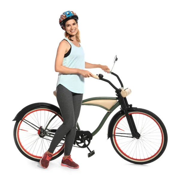 바탕에 자전거와 스포티 여자의 초상화 — 스톡 사진