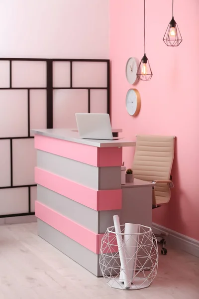 Reception desk in beauty salon. Stylish interior