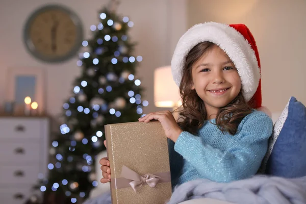 Cute Little Child Santa Hat Christmas Gift Box Sitting Sofa — Stock Photo, Image