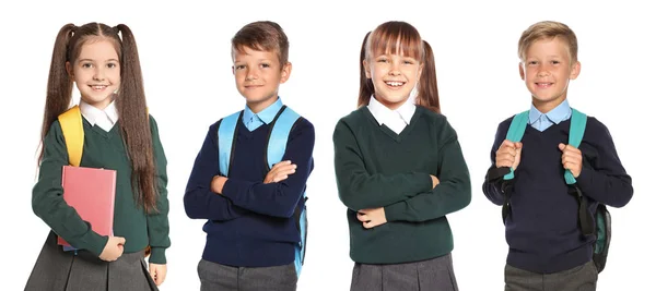 Niedliche Schulkinder Uniform Mit Rucksäcken Auf Weißem Hintergrund — Stockfoto