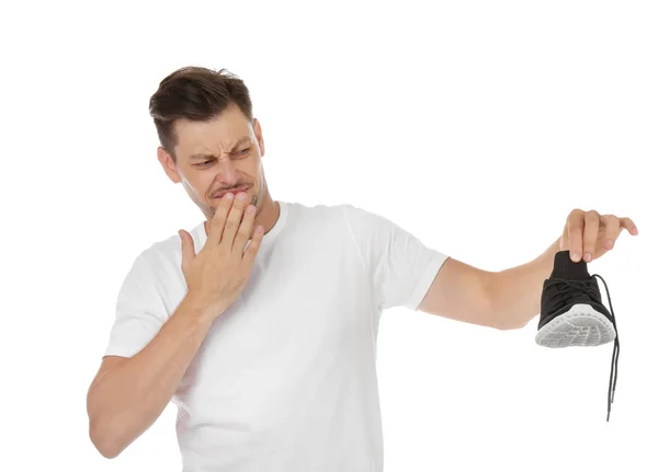 Uomo Che Sente Cattivo Odore Scarpa Sfondo Bianco Deodorante Ambienti — Foto Stock