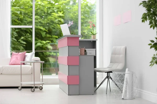 Reception desk in beauty salon. Stylish interior