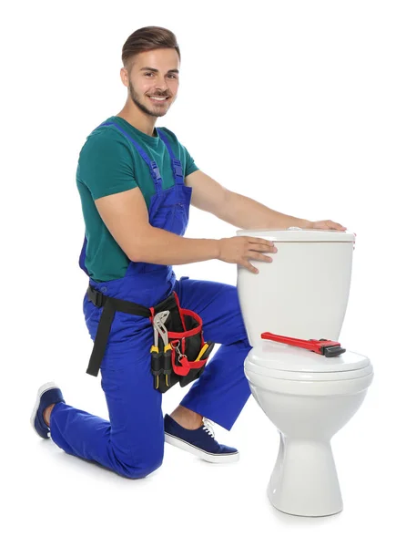 Ung Man Arbetar Med Toalett Tank Isolerad Vit — Stockfoto