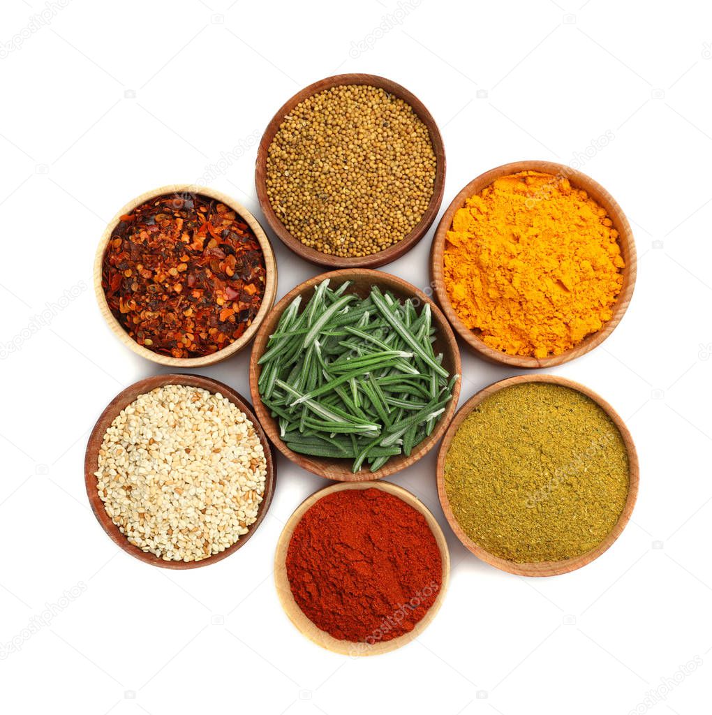 Beautiful composition with different aromatic spices on white background